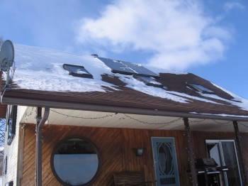 Solar domestic hot water panels on roof 