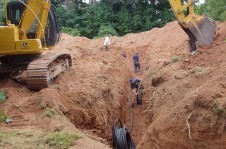 7-8 ft trenches dug in preparation to lay down PVC tubing.